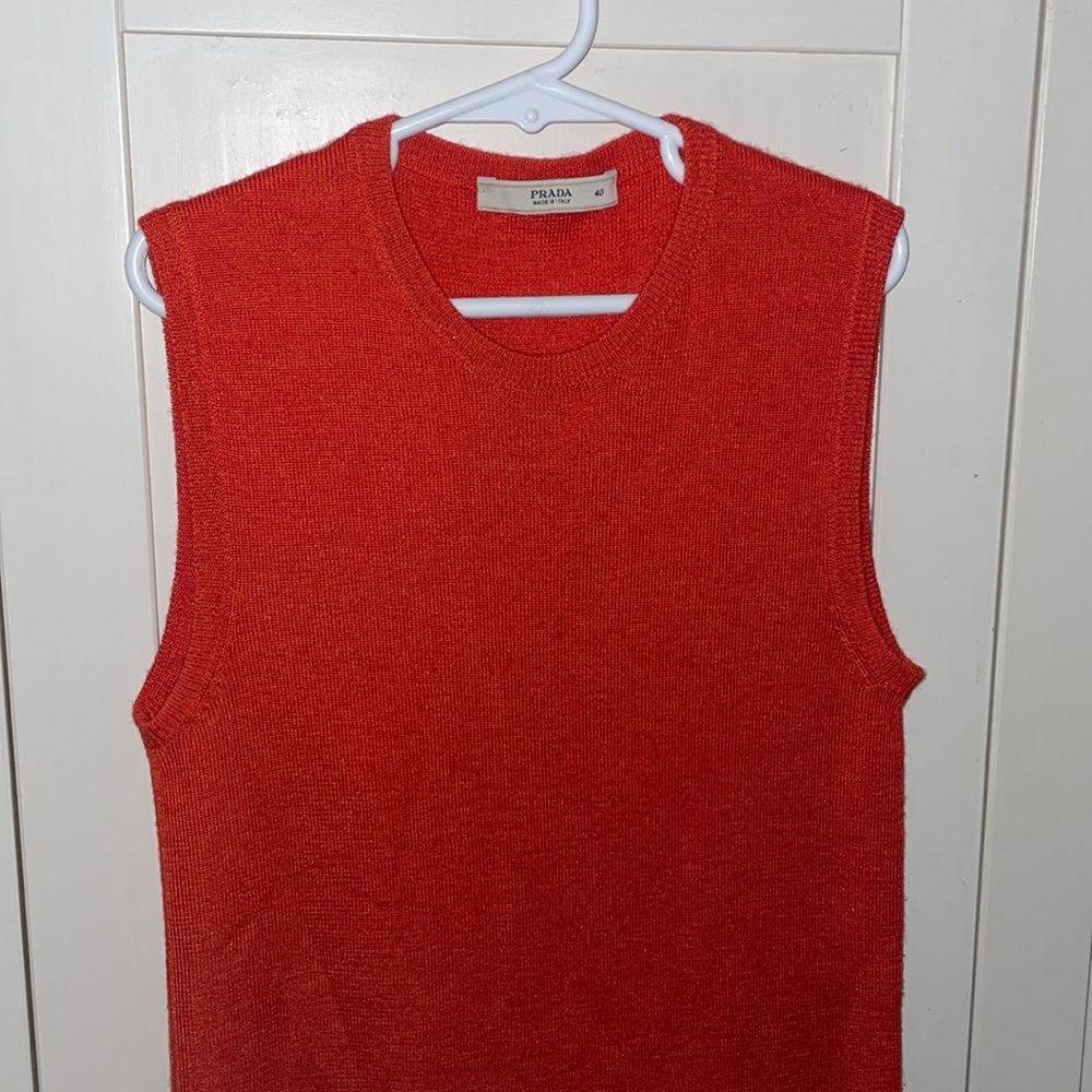 Prada Woman’s orange sleeveless crewneck Prada knit top